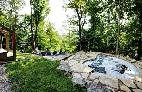 Stoneham Ski Chalet | Relax at Chalet 9A Chemin Blanc with Hot Tub & Pet Access