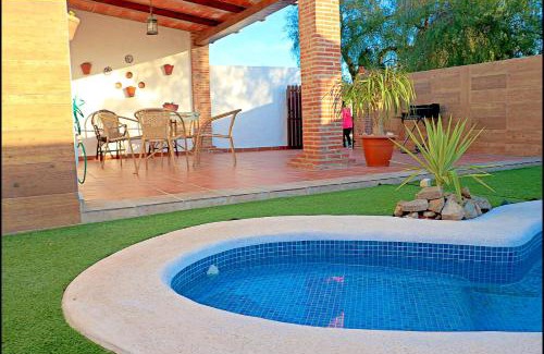 Conil de la Frontera Ski Chalet | Cozy Chalet Retreat with Pool and Perfect 10 Rating