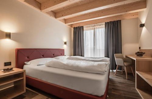 Misurina Apartment | Experience Chalet Alpenrose: 4-Star Rated with Family Friendly Amenities