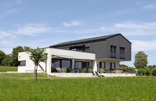 Unterschwarzach Apartment | Experience Chalet am Ried: 4-Star Oasis with Hot Tub