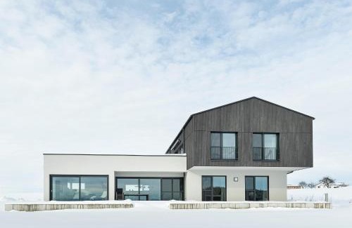 Unterschwarzach Apartment | Experience Chalet am Ried: 4-Star Oasis with Hot Tub