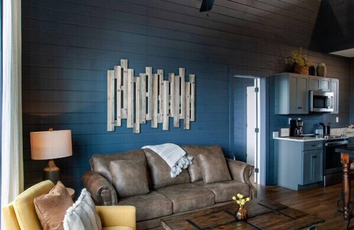 Sevierville Cabin | Escape to Chalet Amelia: Lake View, Hot Tub & Arcade Fun!