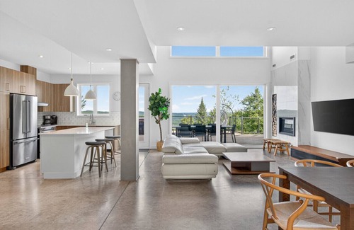 La Conception House | Relax at 220 Rue Du Mont-Assiniboine with Pool & Spa