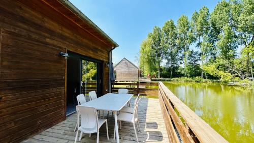 Rue Ski Chalet | Chalet with Terrace Over Water and Scenic Pond View