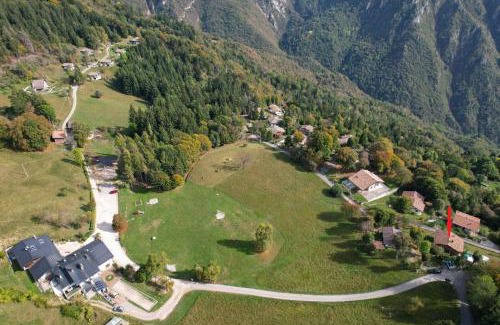 Treviso Bresciano Ski Chalet | Charming Chalet "Baita Cavacca" with Oceanfront Pool