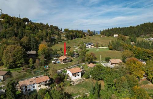Treviso Bresciano Ski Chalet | Charming Chalet "Baita Cavacca" with Oceanfront Pool