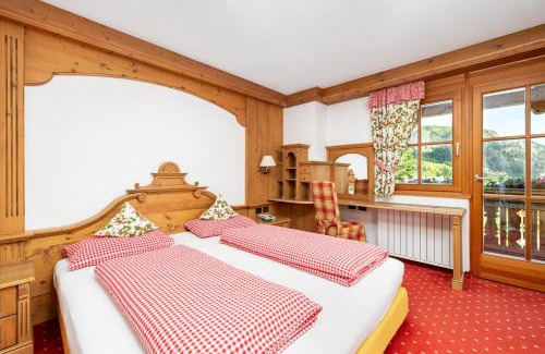 Livinallongo del Col di Lana Hotel | Experience Oceanfront Bliss at Chalet Barbara, Rated 9.4/10