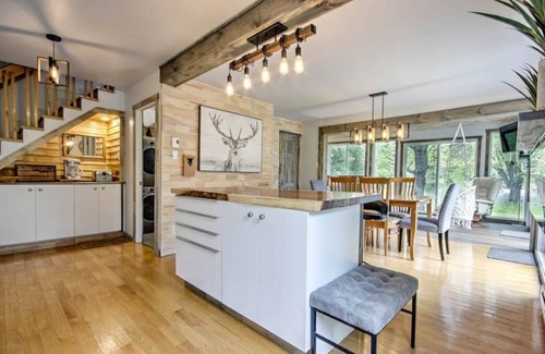 Saint-Jean-de-Matha Ski Chalet | Chalet Blanc: Waterfront Retreat with Spa and Adventure