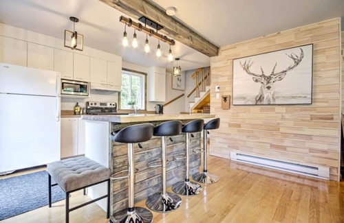 Saint-Jean-de-Matha Ski Chalet | Chalet Blanc: Waterfront Retreat with Spa and Adventure