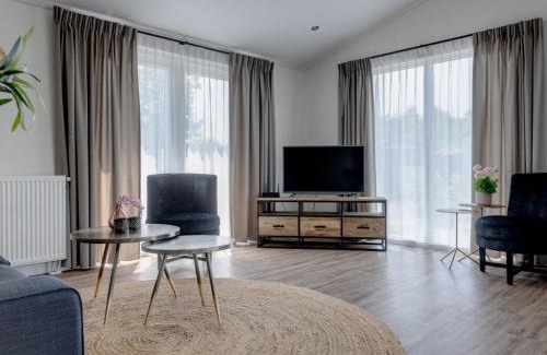 Municipality of Veldhoven Ski Chalet | Modern Chalet Retreat with Pool in Brabant Kempen