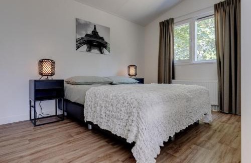 Municipality of Veldhoven Ski Chalet | Modern Chalet Retreat with Pool in Brabant Kempen
