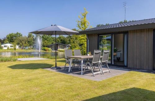 Municipality of Veldhoven Ski Chalet | Modern Chalet Retreat with Pool in Brabant Kempen