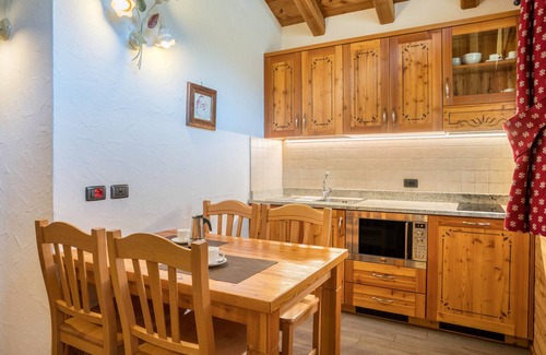 Sant'Antonio di Mavignola Ski Chalet | Inviting Chalet 'Camping Faè' with Mountain Views & Terrace