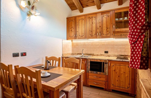 Sant'Antonio di Mavignola Ski Chalet | Chalet 'Camping Faè': Mountain View & Private Terrace Awaits