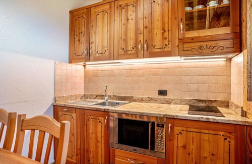 Sant'Antonio di Mavignola Ski Chalet | Chalet 'Camping Faè': Mountain View & Private Terrace Awaits