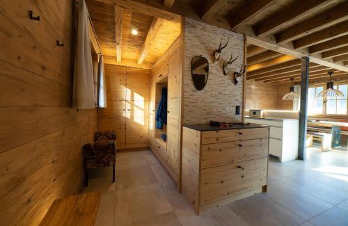 Wildhaus House | Experience Chalet Chäserrugg: 4-Star Comfort with Hot Tub