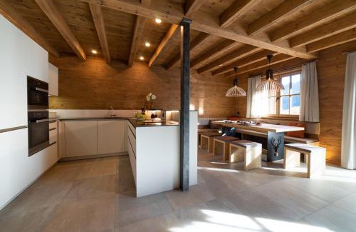 Wildhaus House | Experience Chalet Chäserrugg: 4-Star Comfort with Hot Tub