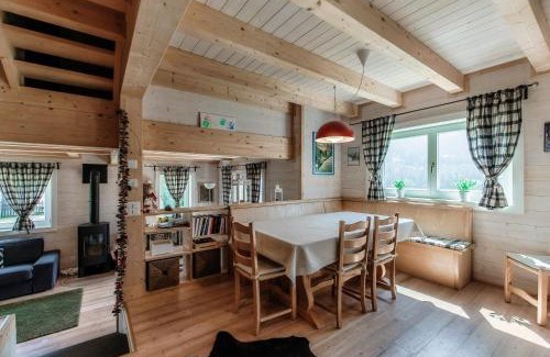 Dalpe Ski Chalet | Discover Chalet Dalpe: Idyllic Retreat Amid Pastures
