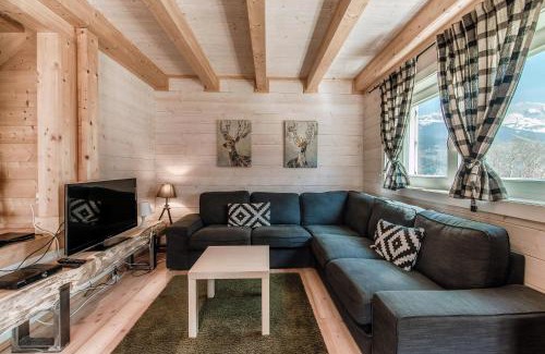 Dalpe Ski Chalet | Discover Chalet Dalpe: Idyllic Retreat Amid Pastures