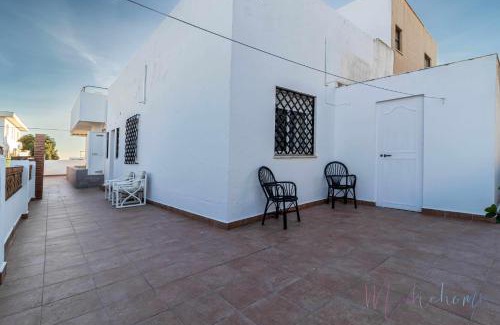 Punta Umbria House | Seaside Chalet: Pet-Friendly with Oceanfront Views