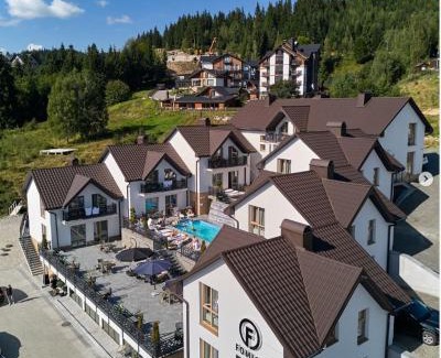 Bukovel Cabin | Chalet Fomich: Oceanfront Oasis with Pool and Family Fun