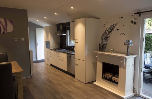 Municipality of Wageningen Ski Chalet | Cozy Chalet Retreat in Gelderland with Pool and Breakfast