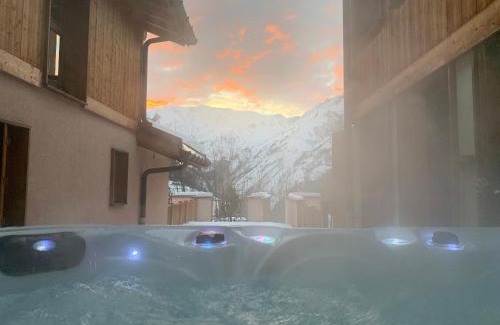 Villarabout Ski Chalet | Experience Chalet Beaufort: Family-Friendly with Hot Tub