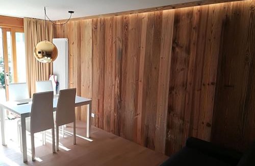 Campo Carlo Magno Apartment | Cozy Chalet Golf Campiglio: Family-Friendly Amenities Await