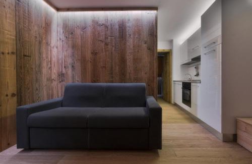 Campo Carlo Magno Apartment | Cozy Chalet Golf Campiglio: Family-Friendly Amenities Await