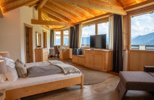 Soprabolzano Hotel | Indulge at Chalet Grumer Suites & Spa: 4-Star Oceanfront Retreat