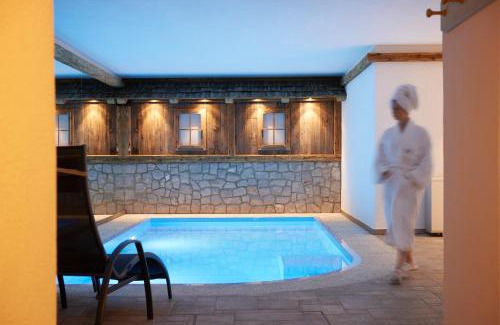Soprabolzano Hotel | Indulge at Chalet Grumer Suites & Spa: 4-Star Oceanfront Retreat