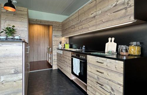 Schenkenfelden House | Chalet im Grünen: Family-Friendly Retreat in Nature