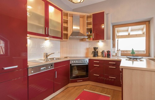 Ellmau Ski Chalet | Ideal Chalet Steps from the Ski Lift with Family Amenities