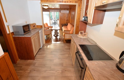 Krasna Lipa Ski Chalet | Perfect Retreat: Fenced-in Home on the Shore with Amenities