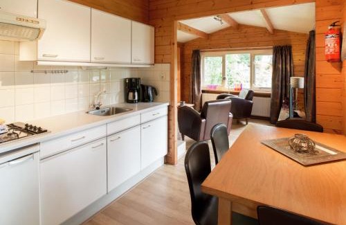 Ootmarsum Ski Chalet | Cozy Chalet with Gas Fireplace in Twente Holiday Park