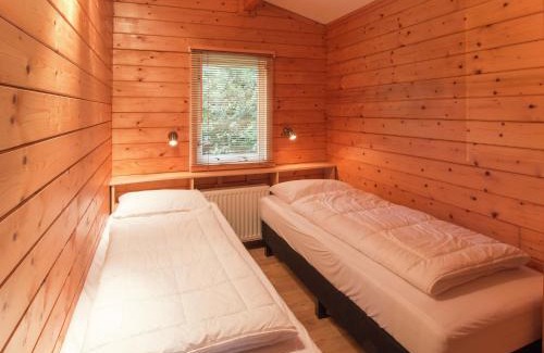 Ootmarsum Ski Chalet | Cozy Chalet with Gas Fireplace in Twente Holiday Park