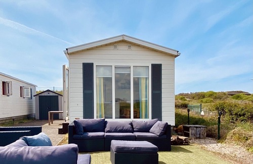 IJmuiden Ski Chalet | Cozy Chalet Steps from the Beach with Pool and Ocean View