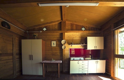 Rogliano Ski Chalet | Cozy Chalet Retreat in Bocchineri Estate's Lush Woods