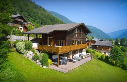 La Cote-d'Arbroz Ski Chalet | Relax in Chalet Isla de Lux with Spa and Hot Tub Amenities