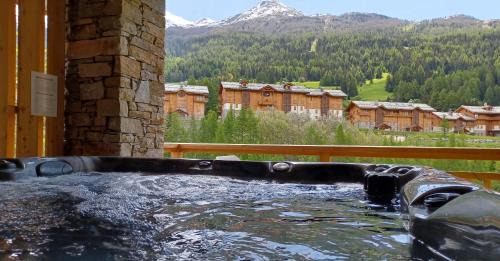 Val Cenis Apartment | Indulge at Chalet L'arcelle with Private Spa & Hot Tub