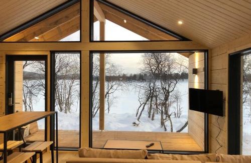 Inari Ski Chalet | Discover Chalet Luokta: Beachfront Escape with Hot Tub