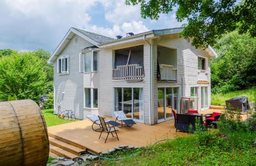 St-Adolphe-d'Howard Ski Chalet | Discover Chalet Mozart: Family-Friendly Getaway with Hot Tub