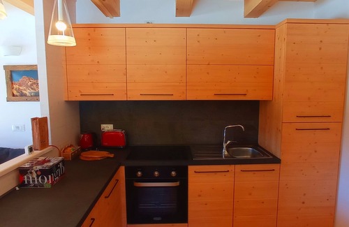 Falcade Apartment | Cozy Chalet on the Meadows with Breakfast & Family Amenities