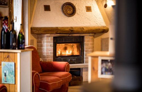 Forni di Sotto Ski Chalet | Discover Chalet Relax Tra Le Vigne - Family-Friendly Retreat