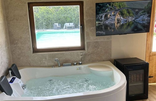 Arles Ski Chalet | Romantic Chalet Retreat with Pool and Hot Tub Amenities