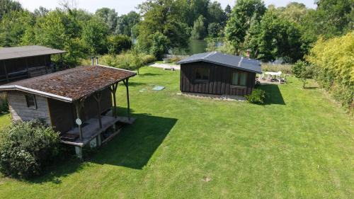 Rigny Ski Chalet | Riverside Retreat: Pet-Friendly Chalet on the Saône