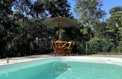 Pirenopolis Ski Chalet | Relaxing Chalet Suite with Heated Pool & Pet-Friendly Amenities