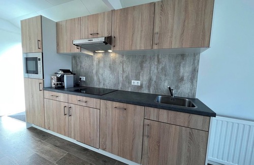 Schaarsbergen House | Inviting 2-Bedroom Chalet with Terrace & Family Amenities