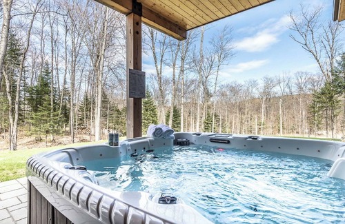 Mont-Tremblant Ski Chalet | Elegant Alpine Chalet with Spa and Breakfast Amenities