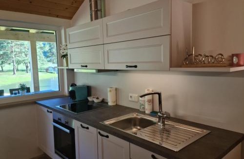 Lassing Apartment | Experience Comfort at Chalets am Badesee Lassing